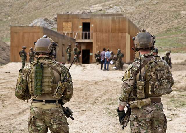 coalition force members oversee afghan soldiers during fc3d98