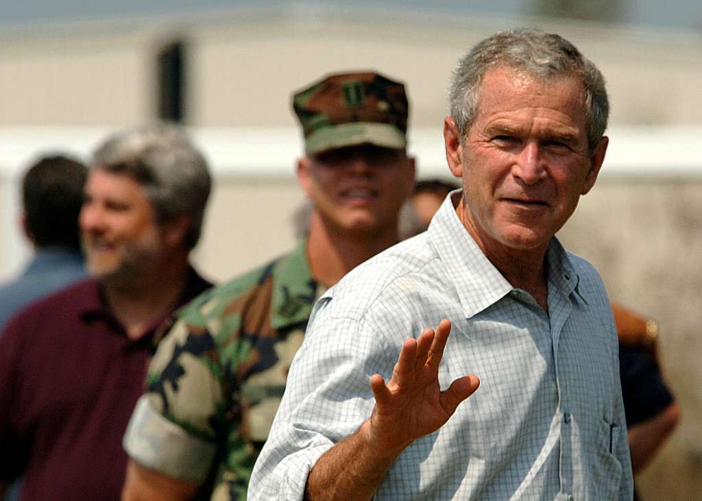 president george w bush waves to us navy seabees assigned to naval mobile construction 4c4677 1024